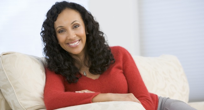 woman-sitting-on-couch