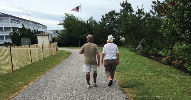 Man-Walking-With-Compression-Stockings