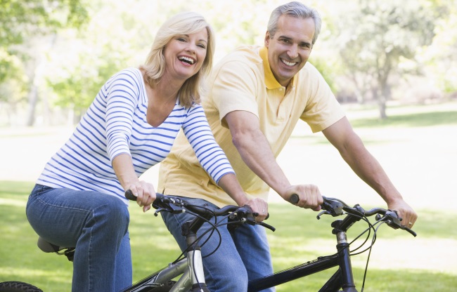 Happy-Couple-Biking-In-Compression-Socks