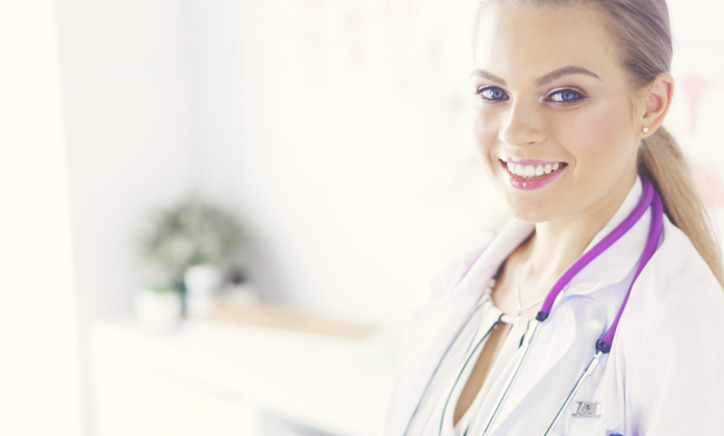 Smiling-Nurse-In-Lab-Coat